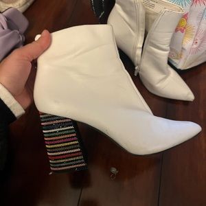 White boots with rainbow rhinestone detailing